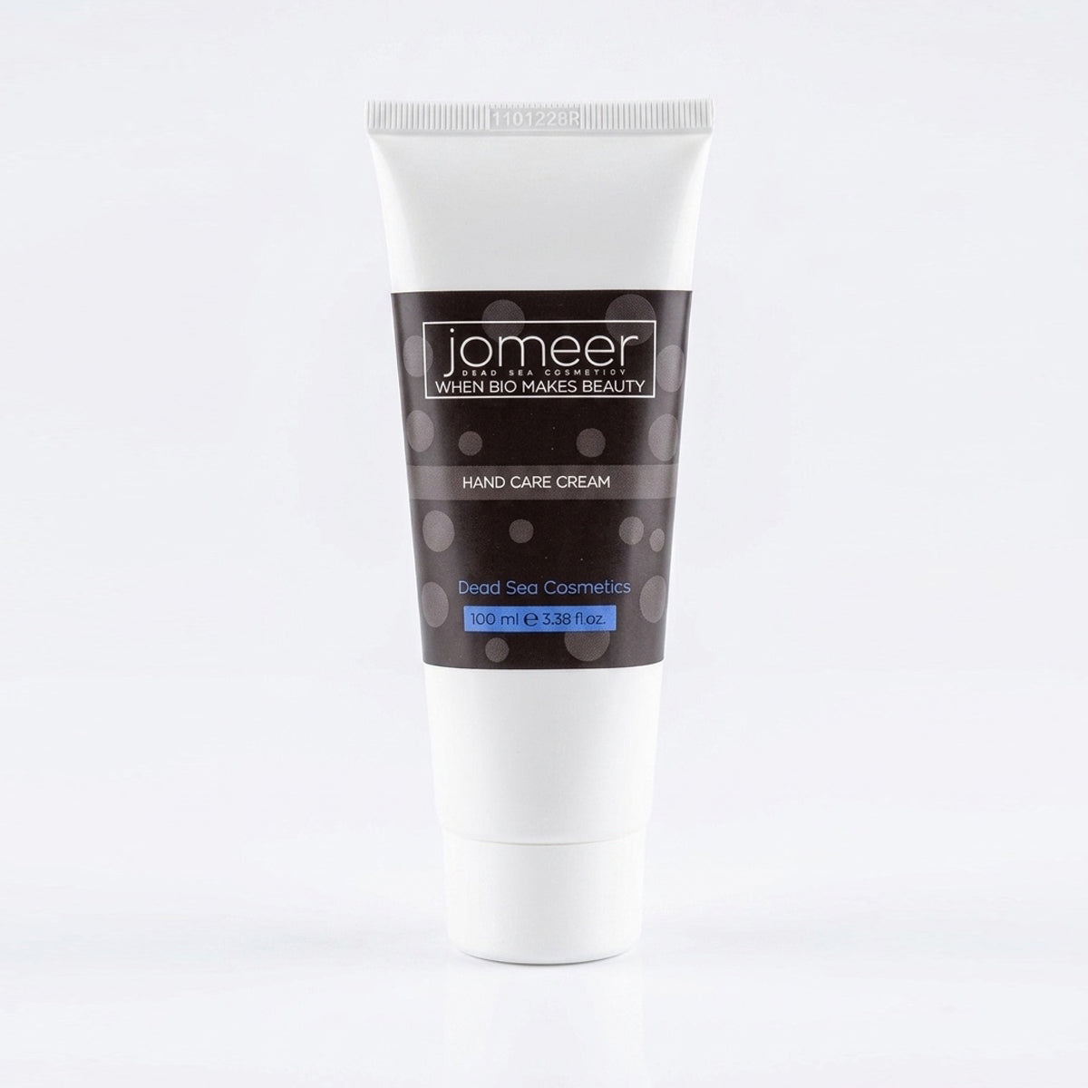 Tube of Jomeer dead sea hand care cream on a white background
