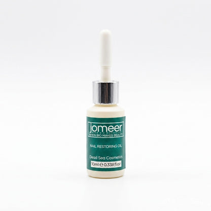 Bottle of jomeer nail restoring oil on a white background