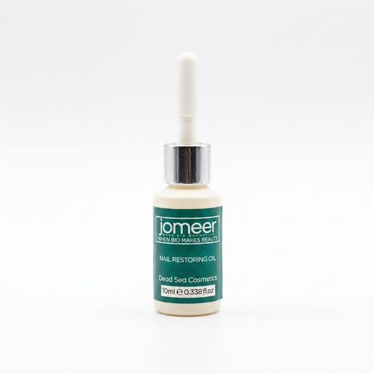 Bottle of jomeer nail restoring oil on a white background
